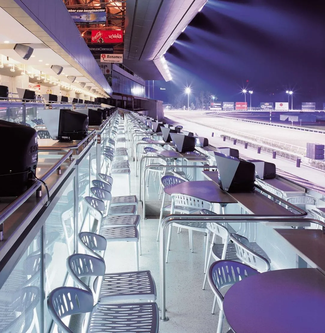 Terrace seating facing the illuminated track