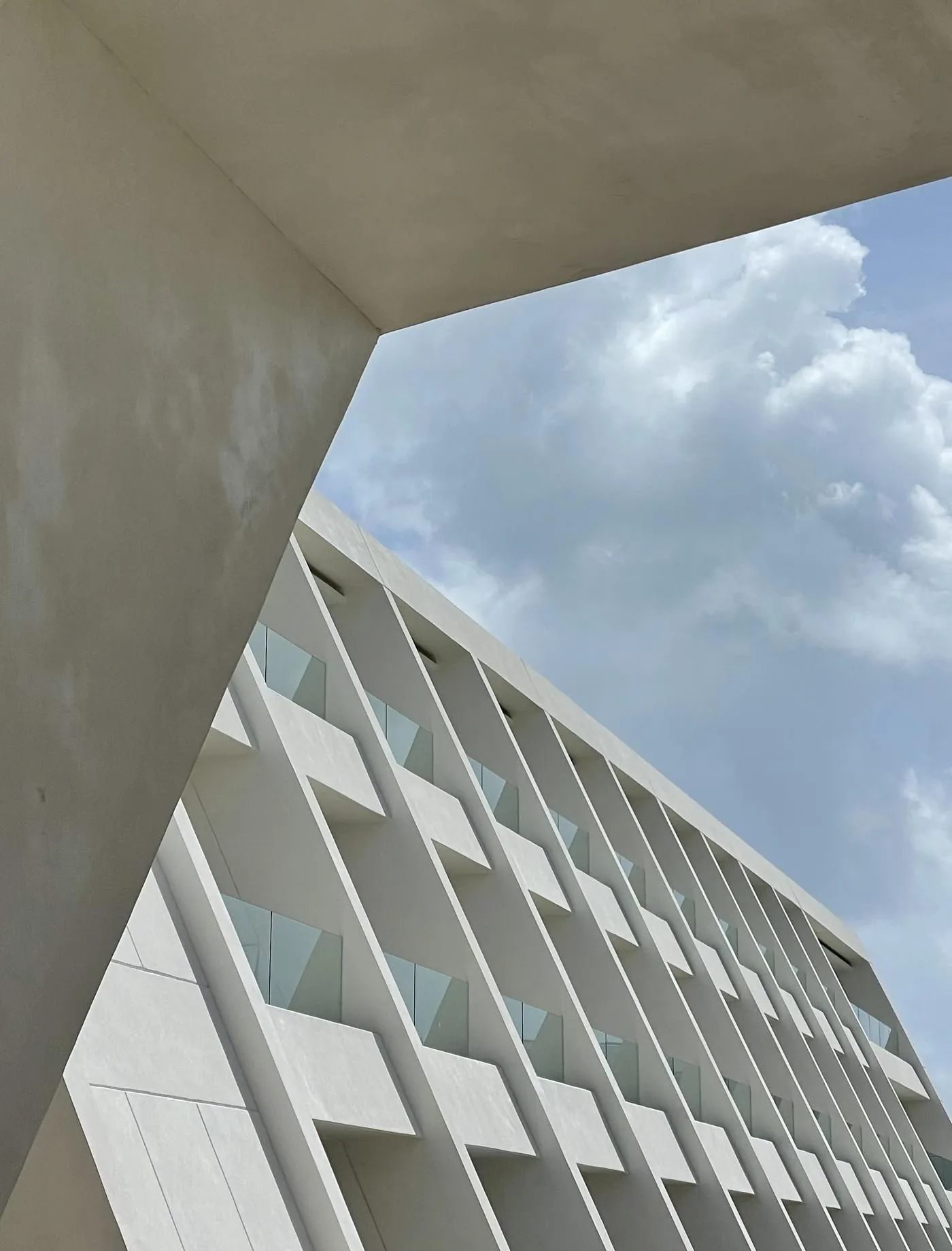 Sloping facade framed from below